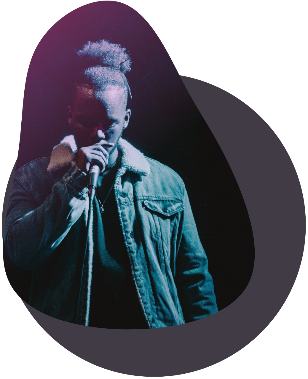 energetic young male dancing in pink illumination